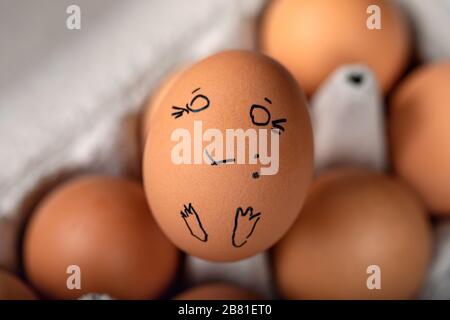 Eggs Faces, drawnigs on eggs on blur background. Stock Photo