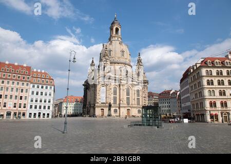 Dresden, Germany. 19th Mar, 2020. The Neumarkt in front of the Frauenkirche is deserted. Where otherwise numerous tourists crowd in the state capital, there is a yawning emptiness. The corona virus is increasingly bringing public life in Saxony to a standstill. Credit: Sebastian Kahnert/dpa-Zentralbild/dpa/Alamy Live News Stock Photo