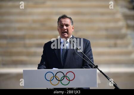 Athens, Greece. 19th Mar, 2020. President of the Hellenic Olympic Commitee Spyros Capralos delivers a speech at the handover ceremony of the Tokyo Olympic Flame at the Panathenaic stadium, in Athens, Greece, on March 19, 2020. Credit: Aris Messinis-pool photo/Xinhua/Alamy Live News Stock Photo