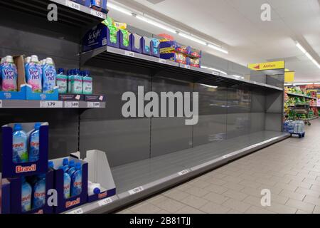 Empty shopping shelves during corona crisis. Stock Photo