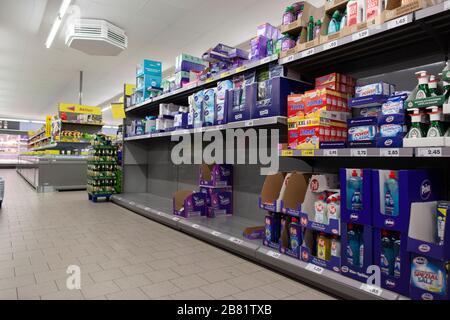 Empty shopping shelves during corona crisis. Stock Photo