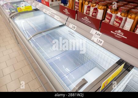 Empty shopping shelves during corona crisis. Stock Photo