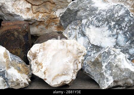 Marble materials for decoration and construction. Variety of decorative natural stones are sold in construction store. Stock Photo