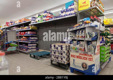 Empty shopping shelves during corona crisis. Stock Photo