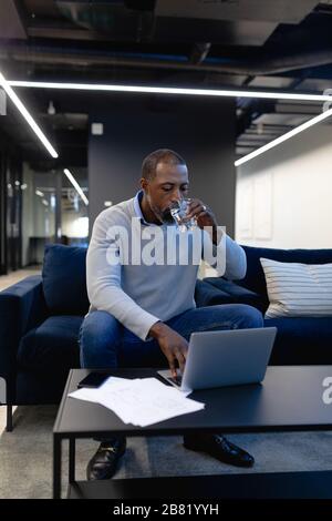 African American man working on his laptop Stock Photo