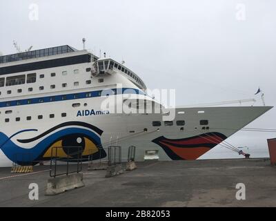 Walvis Bay, Namibia. 13th Mar, 2020. The cruise ship 'AIDAmira' is moored in the port. (to dpa 'War of nerves for cruise passengers in Cape Town continues') Credit: Klaus Blume/dpa/Alamy Live News Stock Photo