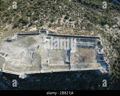 aerial view byzantine historical ottoman empire castle fort on top of mountain in kiafa close to kougi in souli village greece epirus Stock Photo