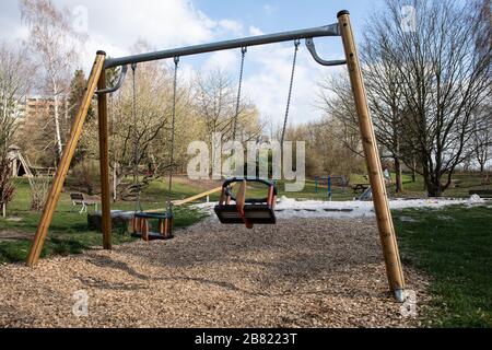 19 March 2020, Lower Saxony, Göttingen: Menschenleerle is a playground with a children's swing. Measures to contain the coronavirus massively affect public life in Lower Saxony. Photo: Swen Pförtner/dpa