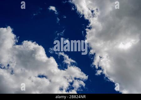 large lush clouds against a blue sky Stock Photo