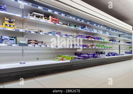 Empty shopping shelves during corona crisis. Stock Photo