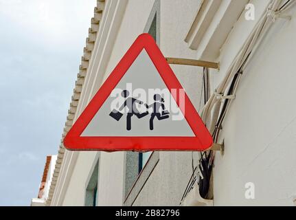 SPANISH SCHOOL CHILDREN WARNING SIGN Stock Photo
