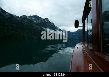 Tourist boat on Königssee / Kings Lake, Berchtesgaden National Park, Bavarian Alps, Bavaria, Germany. Tour Boat on a lake in the mountains, Konigsee. Stock Photo
