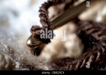 Crochet hook in the work macro view Stock Photo