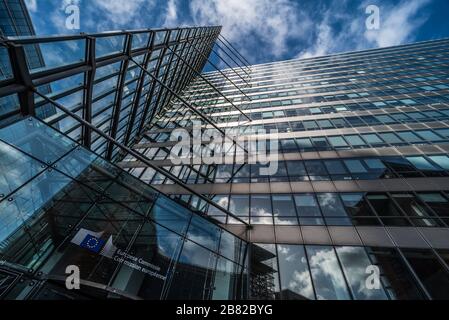 Brussels European District, Brussels Capital Region / Belgium - 02 17 2020:  Low angle view of the contemporary staff entrance of a building of the Eu Stock Photo
