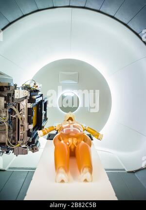 Test dummy at a cancer Radiation Proton beam therapy treatment room in hospital. Uppsala, Sweden. Stock Photo