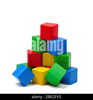 Colorful wooden toy blocks against white background Stock Photo