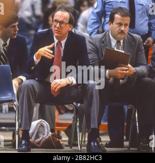 SYRACUSE, NEW YORK, USA, 1984 - Syracuse University head basketball Coach Jim Boeheim, left, and assistant coach Bernie Fine, in Carrier Dome. Stock Photo