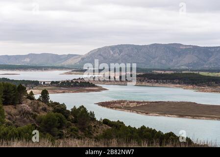 Buendia reservoir with turquoise waters in spring. La Alcarria region, Spain Stock Photo