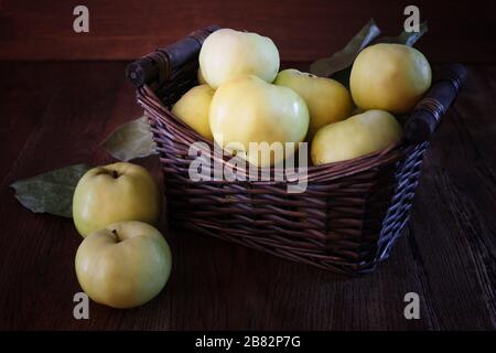 apples basket- Symbolic image. Concept for healthy nutrition. wooden background. Front view. Copy space. Stock Photo