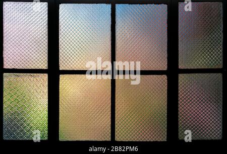 Symmetrical and colorful backlit window Stock Photo