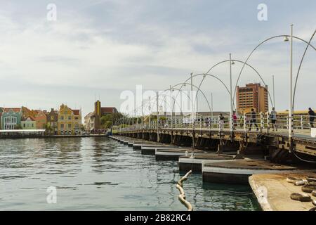 Gorgeous view of the moving pontoon Queen Emma Bridge across St. Anna Bay. Willemstad. Curacao. Stock Photo