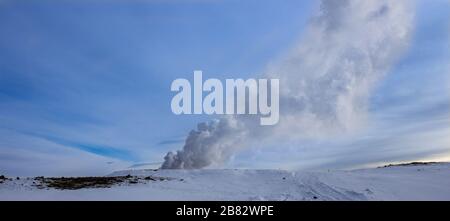 water vapour comes out of the ground in winter landscape Stock Photo