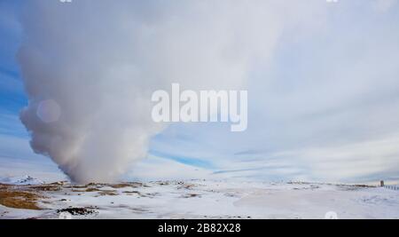 water vapour comes out of the ground in winter landscape Stock Photo