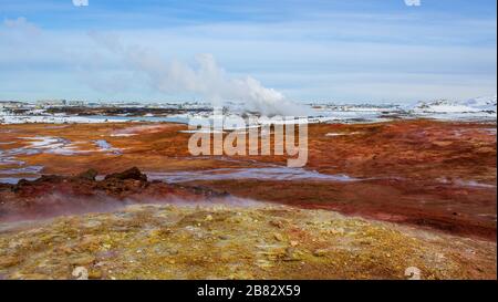 water vapour comes out of the ground in winter landscape Stock Photo