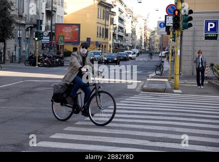 Milan, Italy. 19th Mar, 2020. Milan, CORONAVIRUS - People around the city. Pictured: People on the street Credit: Independent Photo Agency/Alamy Live News Stock Photo