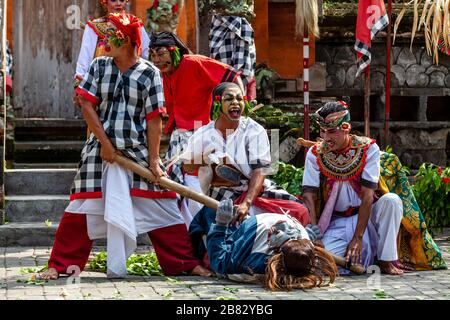 Local People Performing In A Traditional Balinese Barong and Kris Dance Show, Batabulan, Bali, Indonesia. Stock Photo