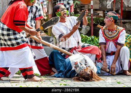 Local People Performing In A Traditional Balinese Barong and Kris Dance Show, Batabulan, Bali, Indonesia. Stock Photo