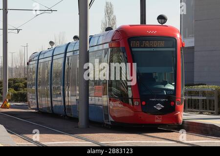 Madrid, Spain - March 3, 2020: Train of the Metro Ligero Oeste of Madrid public transport service, operating as it passes through the Ciudad del Cine. Stock Photo