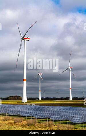 Wind power plants, wind park, solar plant, photovoltaic power plant, near Langen, Lower Saxony, Germany, Stock Photo