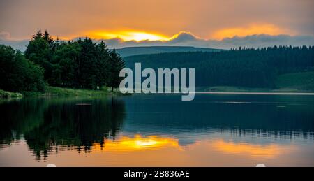 Sunset and reflection on Lake, Llyn Clywedog Stock Photo