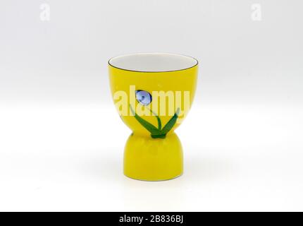 Yellow egg cup Stock Photo