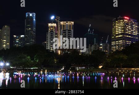 Kuala Lumpur, Malaysia - November 28, 2019: KLCC park with illuminated fountain at night