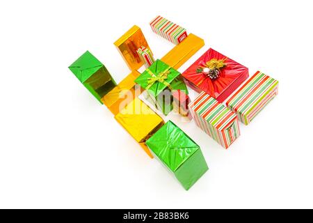 Shopping in colorful packaging. Boxes with xmas presents wrapped. Isolated on white background Stock Photo
