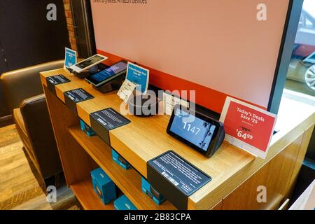 Seattle, WA/USA-9/15/19: An Amazon Kindle Paperwhite, Fire, Alexa Echo Dot, and Echo Show 5 for sale an Amazon Bookstore.  Amazon Alexa, known as Alex Stock Photo