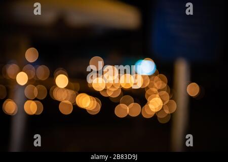 Warm window color bokeh circles of light scattered celebration atmosphere Stock Photo