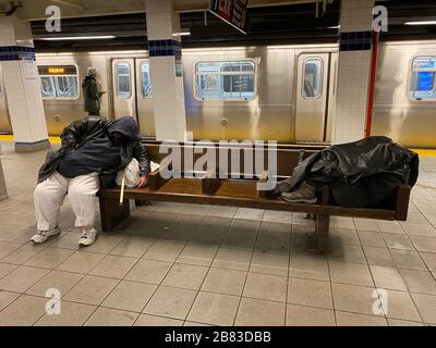 Many homeless people in New York City take refuge in subway stations to ...