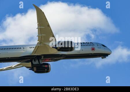 LONDON, ENGLAND - MARCH 2019: Air Canada Boeing 787 Dreamliner climbing after take off from London Heathrow Airport Stock Photo