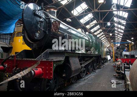 “Witherslack Hall” Modified Hall Class, 4-6-0, steam engine number 6990, built in 1948.Great Central Railway, Loughborough, Leicestershire, England Stock Photo