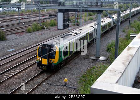 London Northwestern Railway train, Class 350, Electric Multiple Unit, on the West Coast Main Line at Rugby, Warwickshire, England Stock Photo