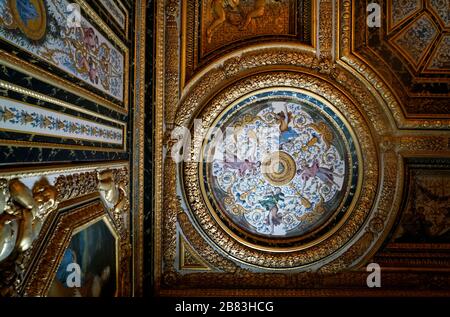 The ceiling decoration in the bedroom of Anne of Austria, the wife of King Louis XIII in Pope's apartment.Palace of Fontainebleau.Seine-et-Marne.France Stock Photo