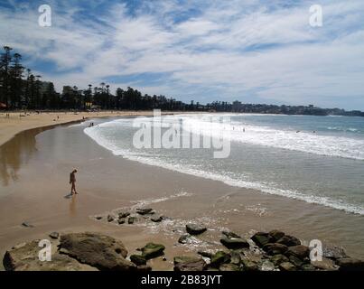 People enjoying the surf & sunshine at Manly beach,Sydney,New South Wales,Australia. Stock Photo