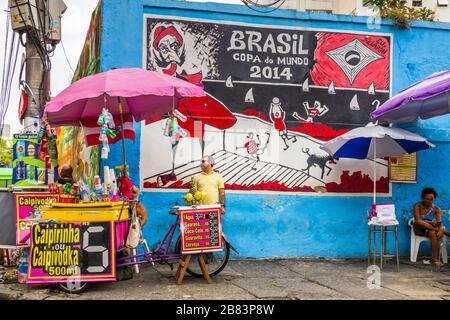 Stalls at te foot of the Escadaria Selaron (Selaron Steps) created by artist Jorge Selaron and Brazil Wold Cup mural, Rio de Janeiro, Brazil Stock Photo