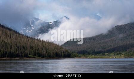 The Never Summer Range is south of Long Draw Reservoir. This is a view from the shore line on Long Draw Reservoir in Northern Colorado. Stock Photo