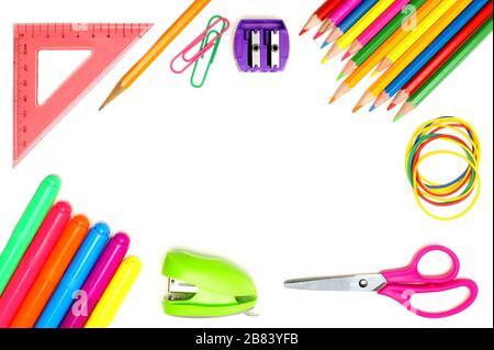 Colorful school supplies frame over a white background Stock Photo