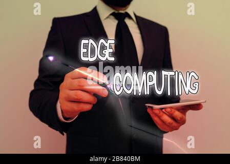 Conceptual hand writing showing Edge Computing. Concept meaning practice of processing data near the edge of your network Stock Photo