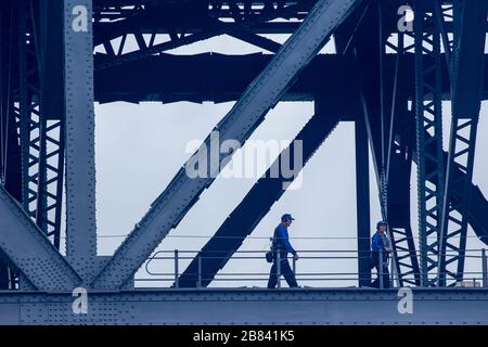 Worker on a bridge in Sydney Australia Stock Photo